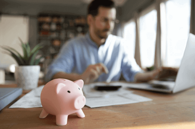 close up focus on pink piggy bank, save money or salary concept